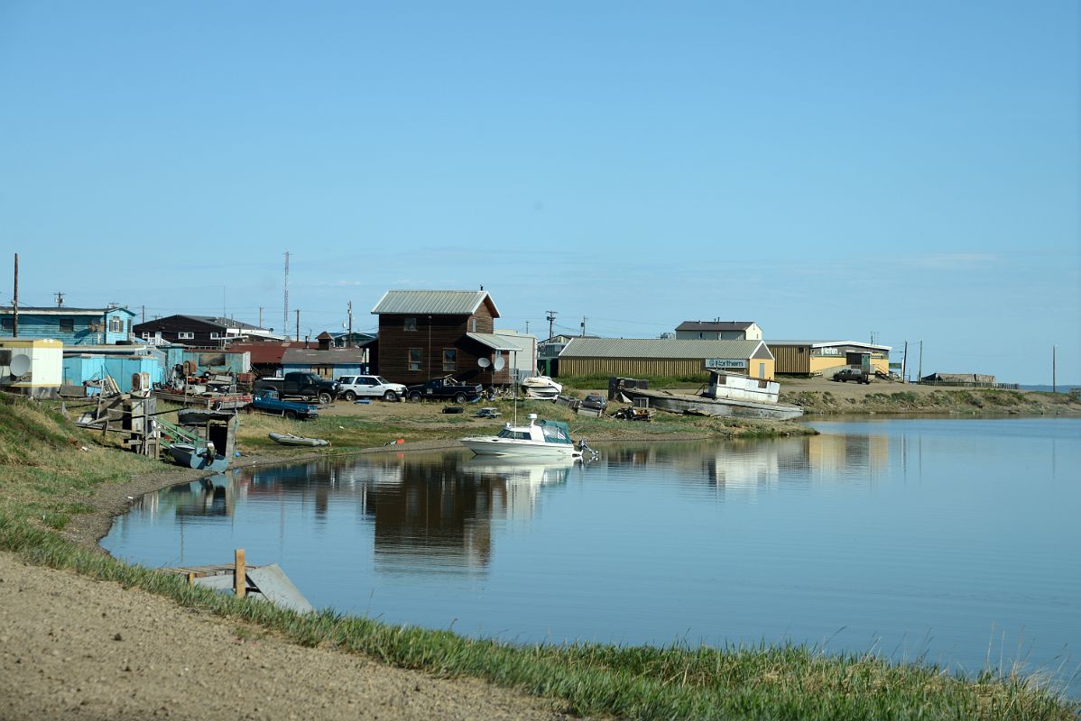 13B Boats In The Water And Lining The Shore With Northern Store Beyond On Arctic Ocean Tuk Tour In Tuktoyaktuk Northwest Territories